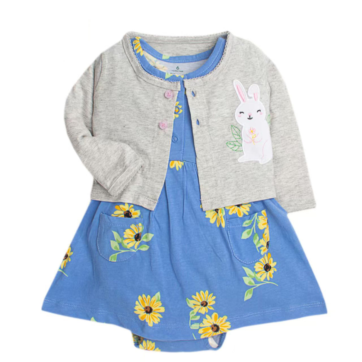 Vestido celeste con flores y saquito floreado